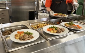 Meal service in the dining room at Hutt St Centre