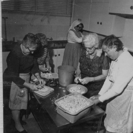 Volunteers preparing meals in Edward Hall